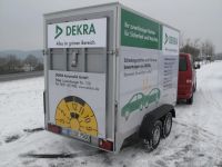 Beschriftung eines Kofferanhängers im Maß 3000 x 1940 m